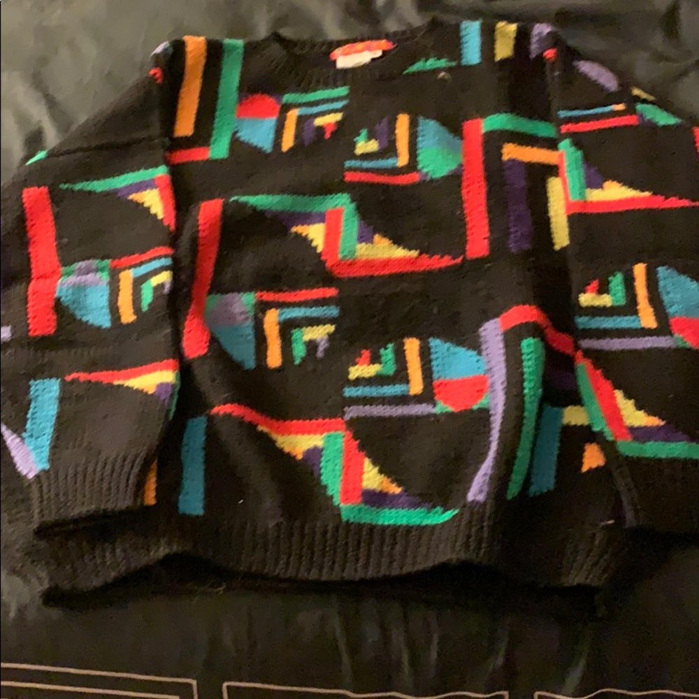 One men’s 100% wool sweater multicolored design